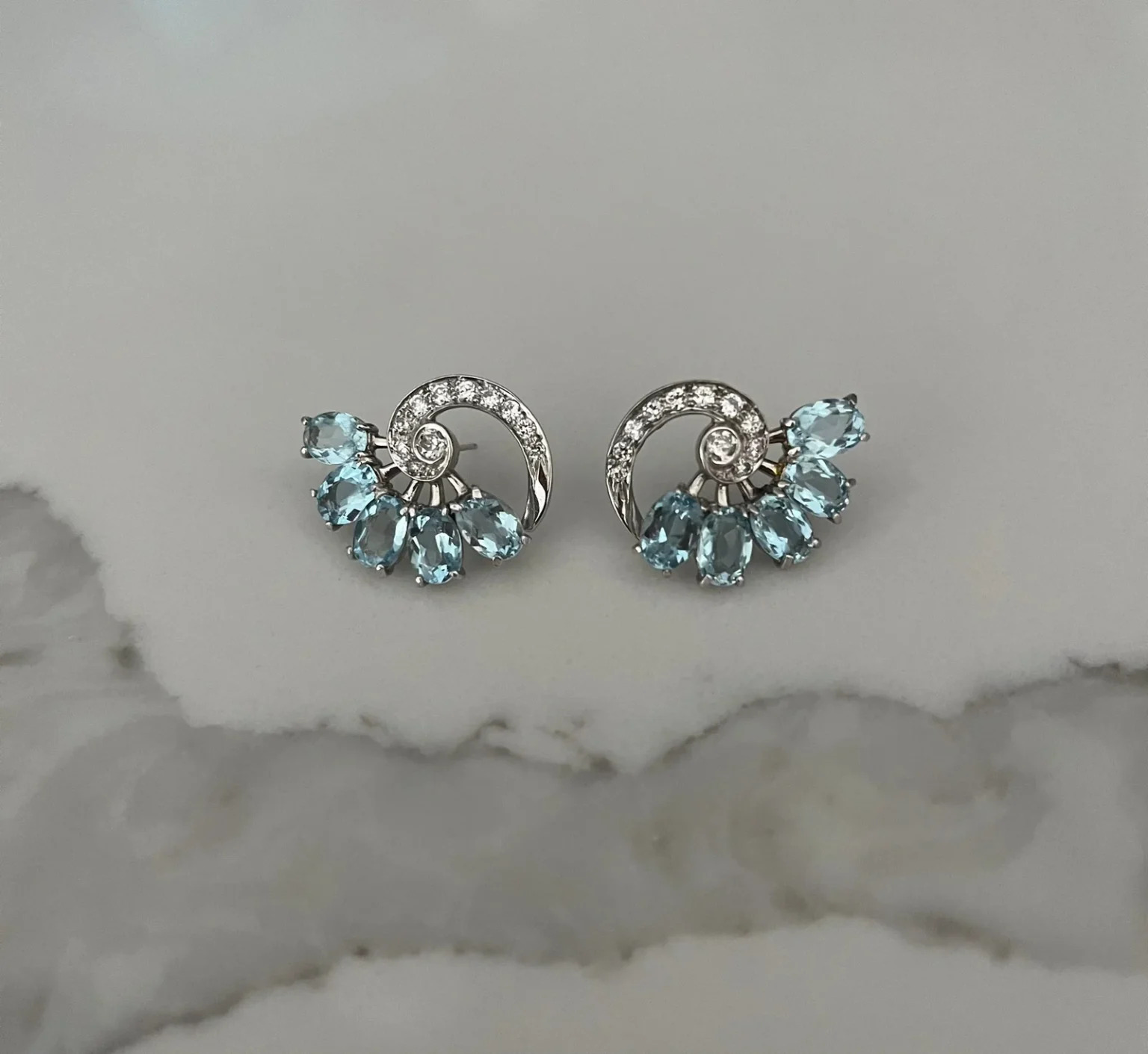 Art Deco Diamond and Aquamarine Platinum Earrings showcasing geometric elegance and refined vintage craftsmanship.