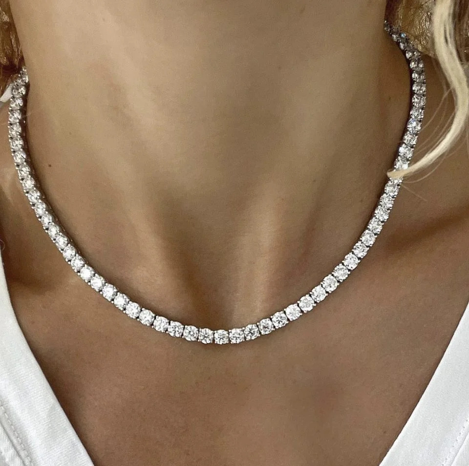 Diamond Tennis Straight Line Necklaces showcasing a classic straight line of perfectly matched diamonds.