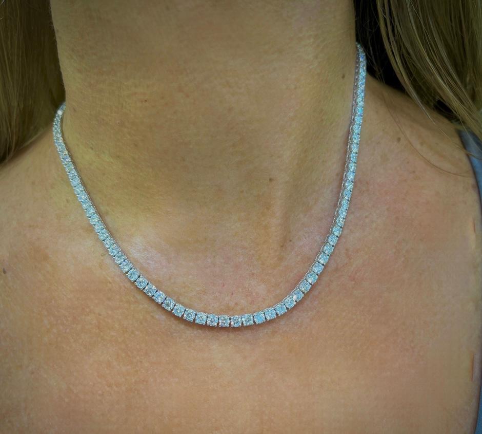 Diamond Tennis Straight Line Necklaces set in yellow gold for timeless warmth and contrast.