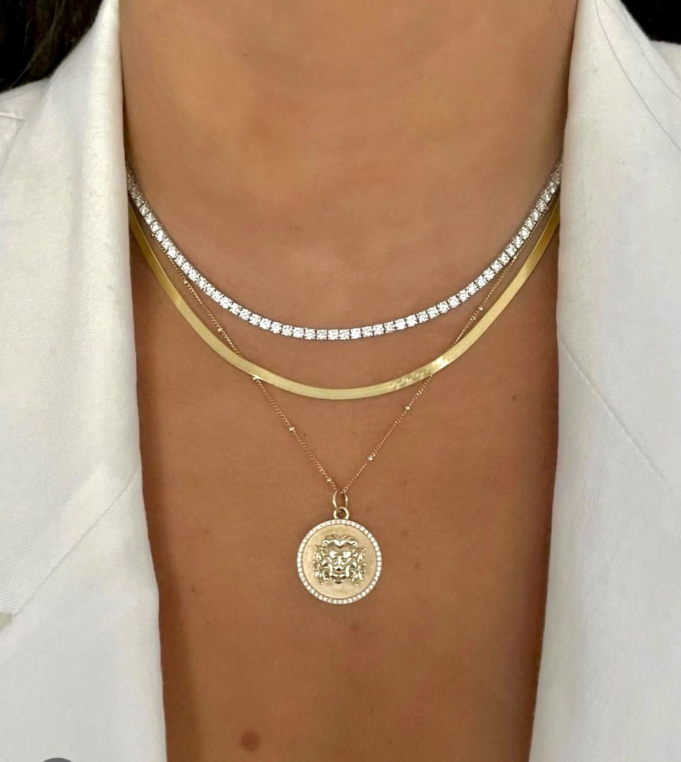 Diamond Tennis Straight Line Necklaces admired as collectible fine jewelry pieces.