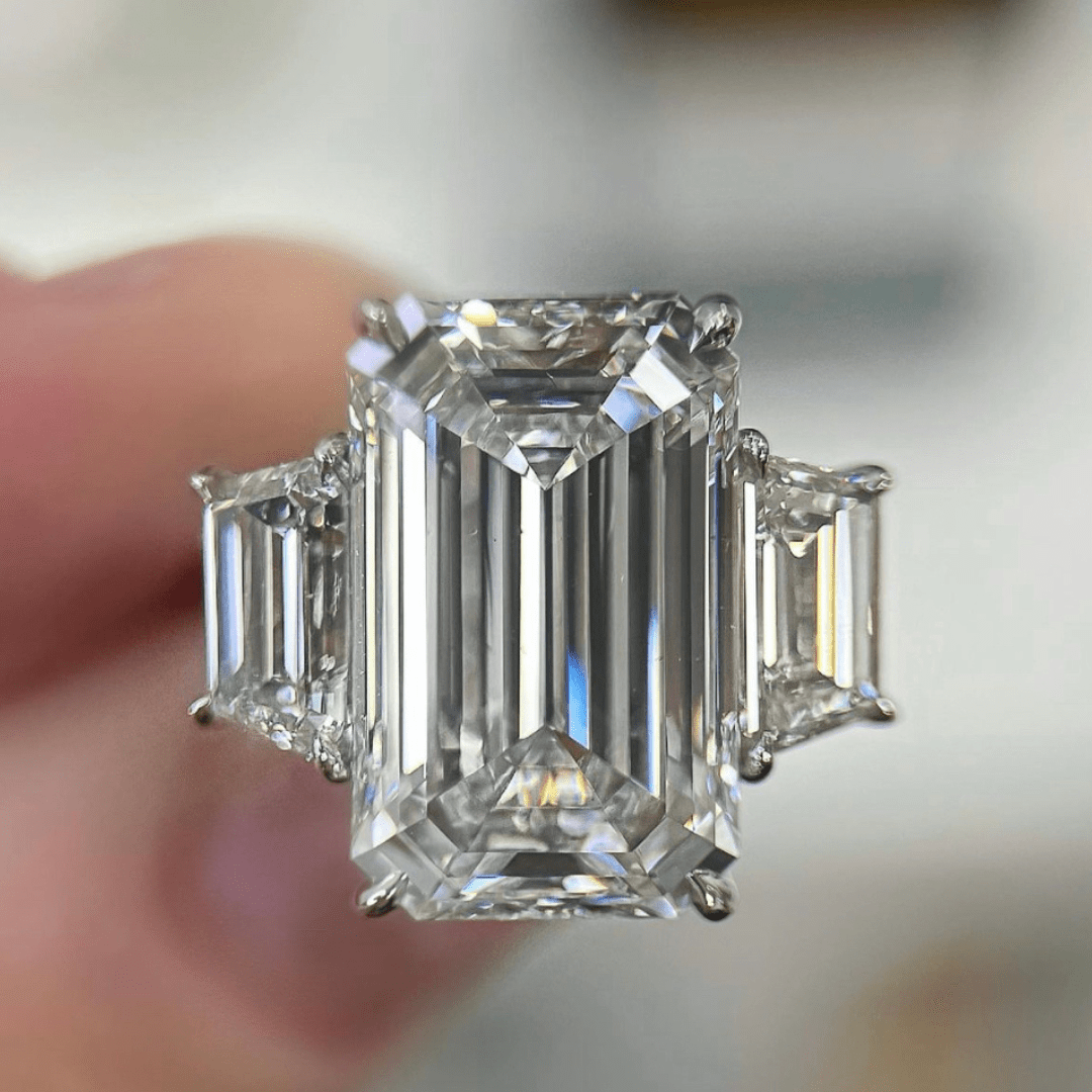 Emerald cut halo diamond ring inspired by the luxury of Engagement Rings in Boca Raton.