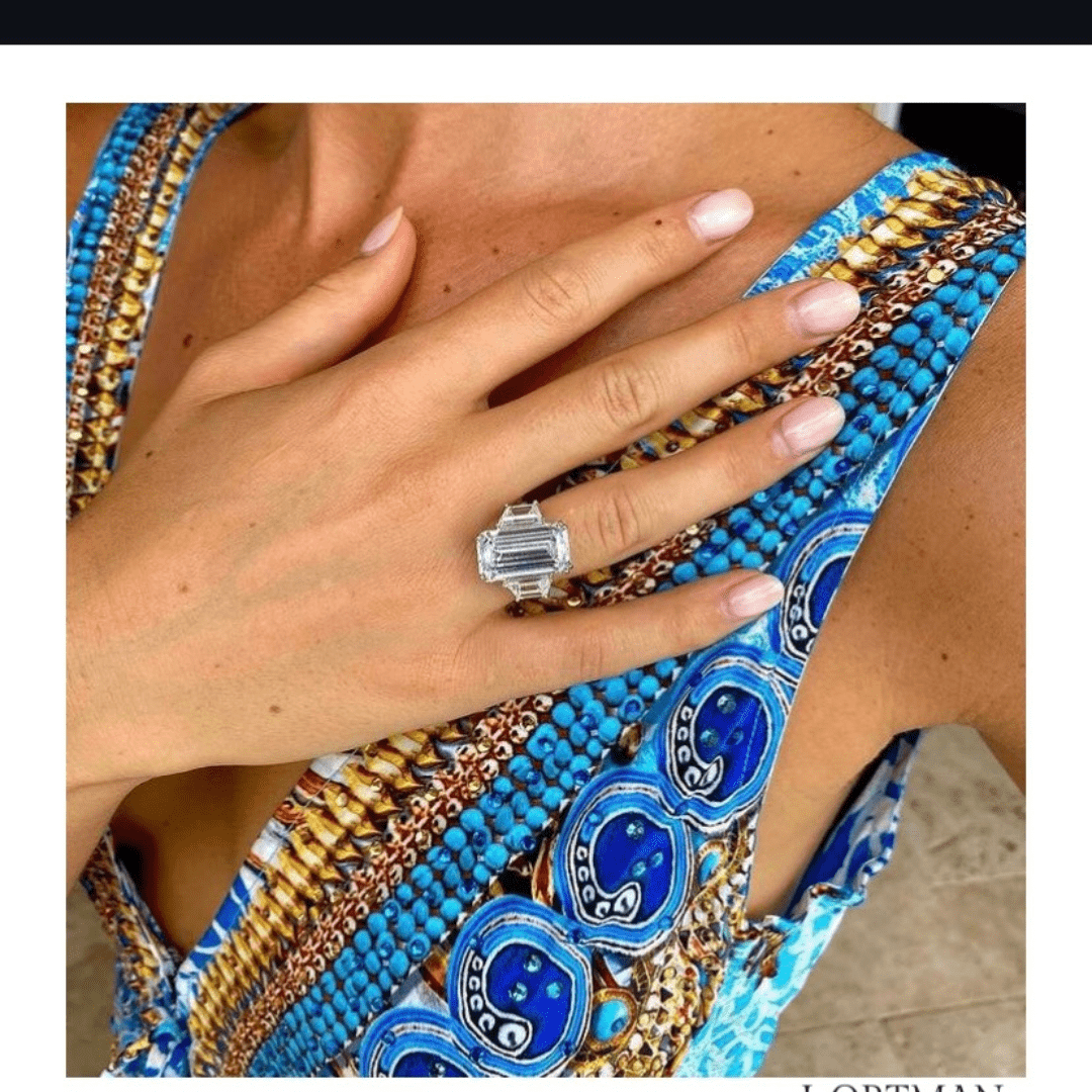 Elongated emerald cut diamond ring aligned with Engagement Rings in Boca Raton style.