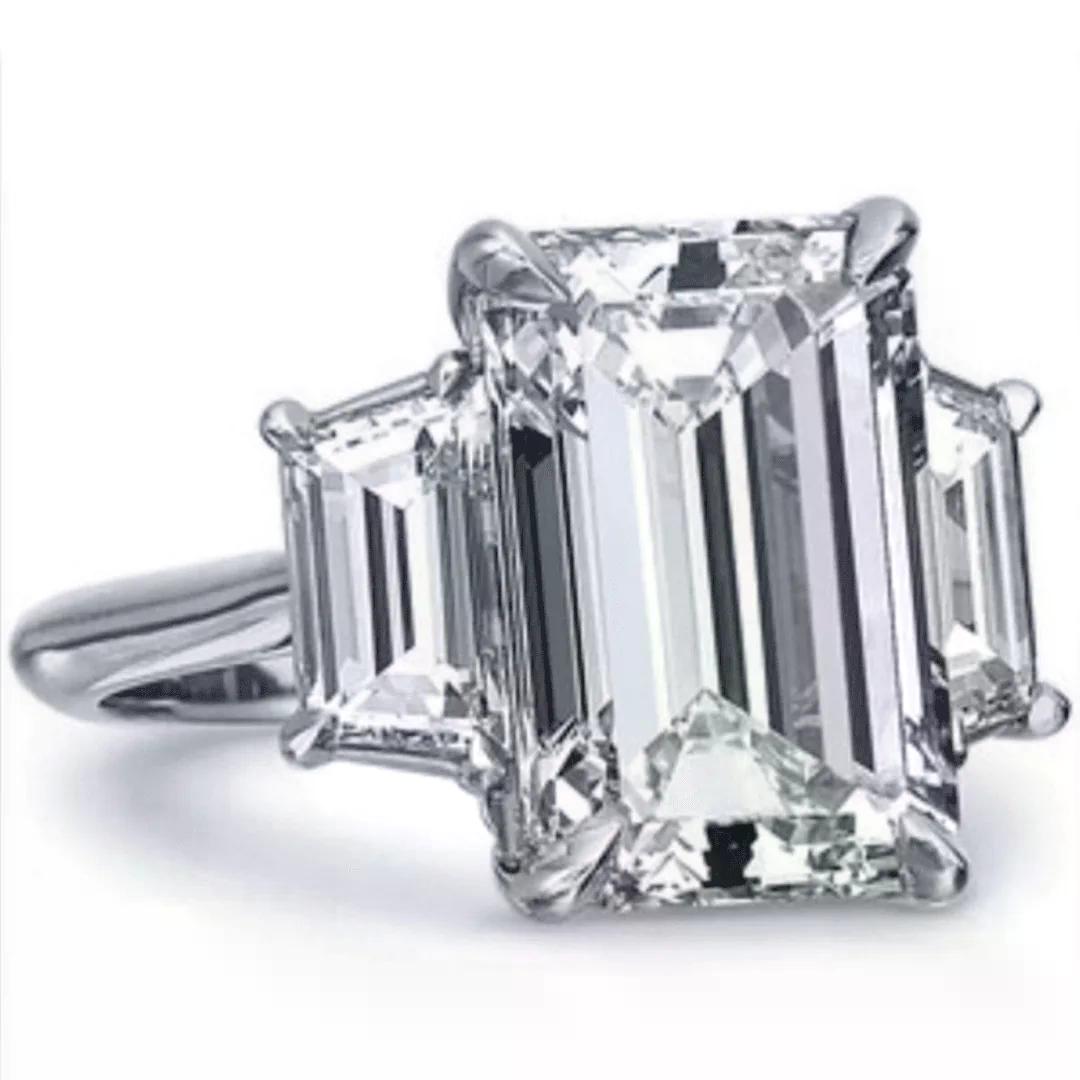 Emerald cut solitaire diamond ring reflecting the refined elegance of Engagement Rings in Boca Raton.
