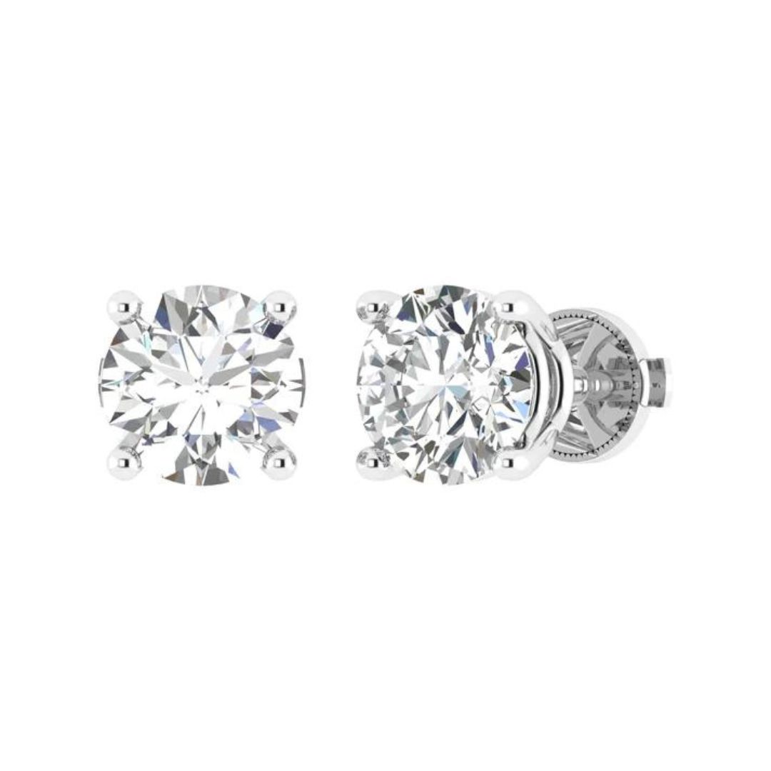 Timeless diamond stud earrings representing the classic beauty of Vintage Jewelry Boca raton.