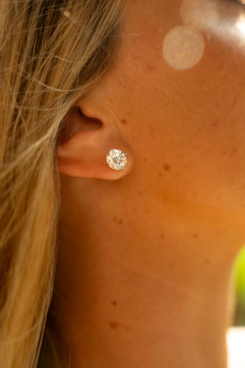 Classic diamond stud earrings showcasing the heirloom appeal of Vintage Jewelry Boca raton fine jewelry.